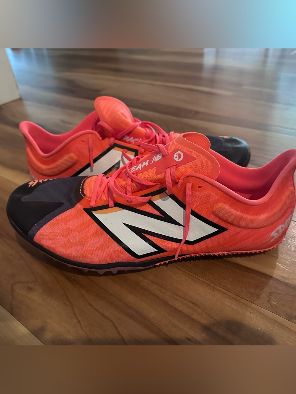 New Balance Orange and Black Track Spikes